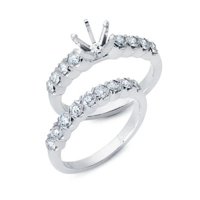 Solitaire Engagement Ring with Shared Prong Set Diamonds and Matching Wedding Band
